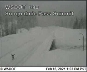 snoqualmie pass closed person standing i90